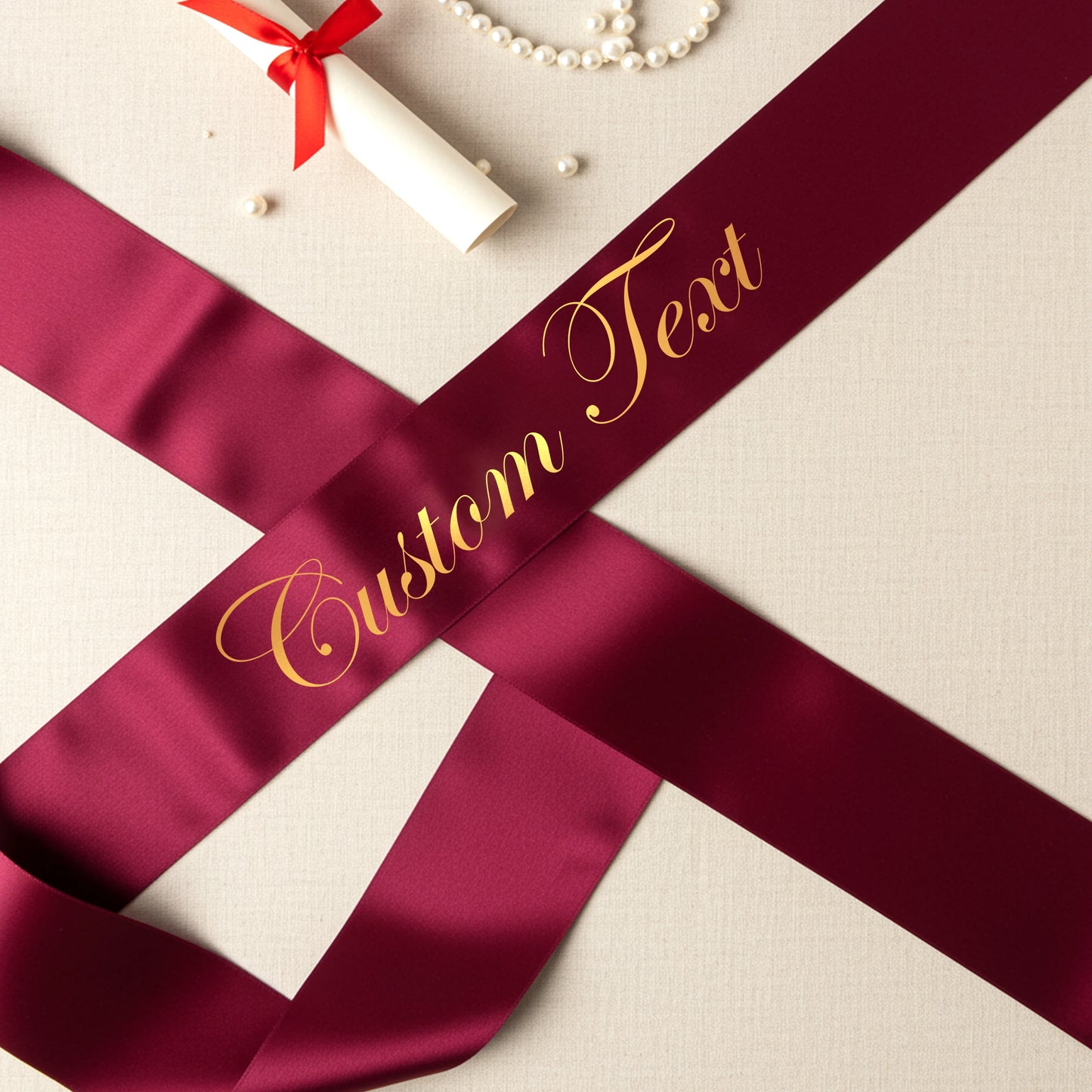 Maroon ribbon with 'Custom Text' in gold on a light background